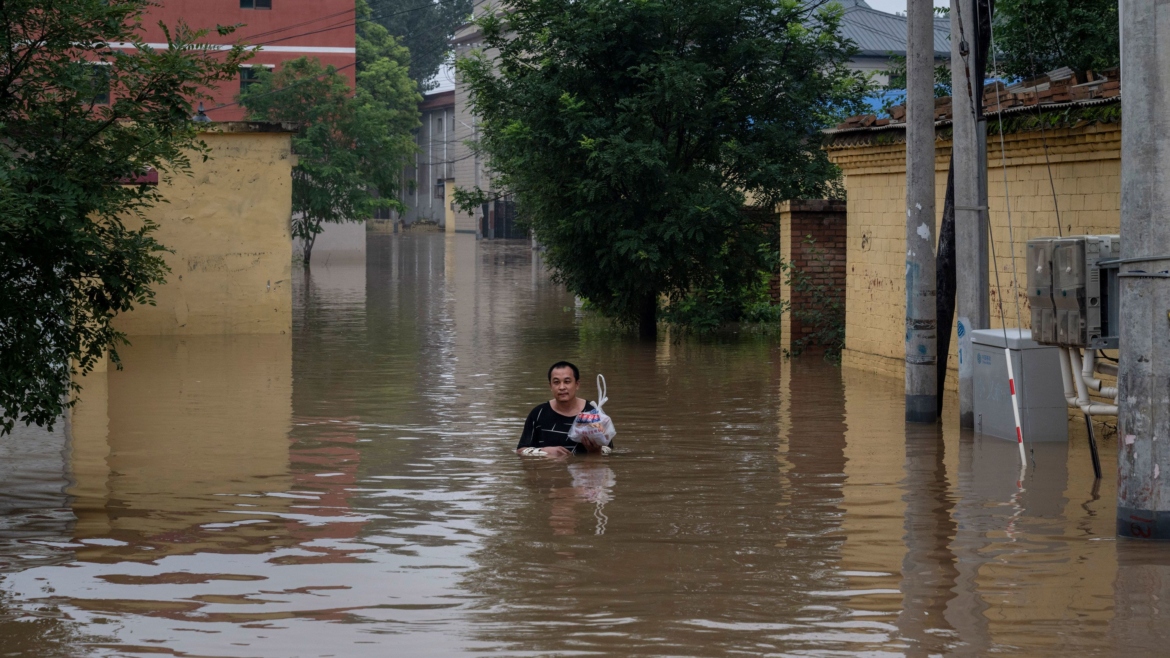 China warns of more rains after flooding in northeast