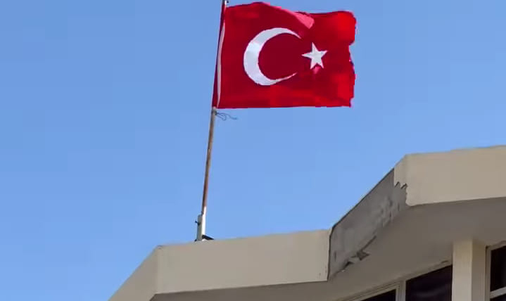 Four people have been detained in Tunisia for mistakenly raising the Turkish flag on a government building