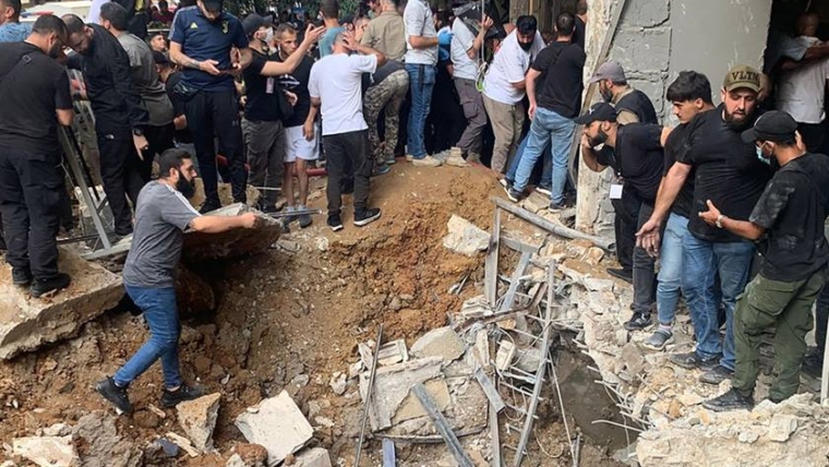 Death toll from Israeli attack on southern Beirut suburbs rises to 12 dead and 66 wounded