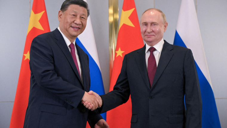 Xi pledges ‘world peace’ in New Year’s message to Putin