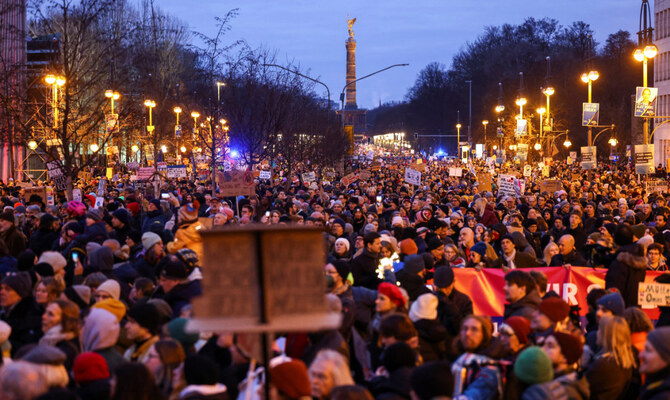 Widespread protests in Berlin against plans to restrict immigration